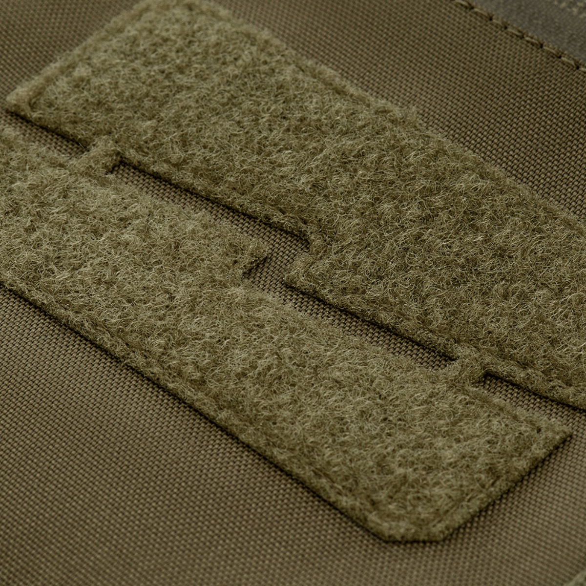 Nærbillede af M-Tac Taktisk Håndvarmer Elite med slidstærkt Cordura 500D og blødt fleecefor for maximal varme og komfort.