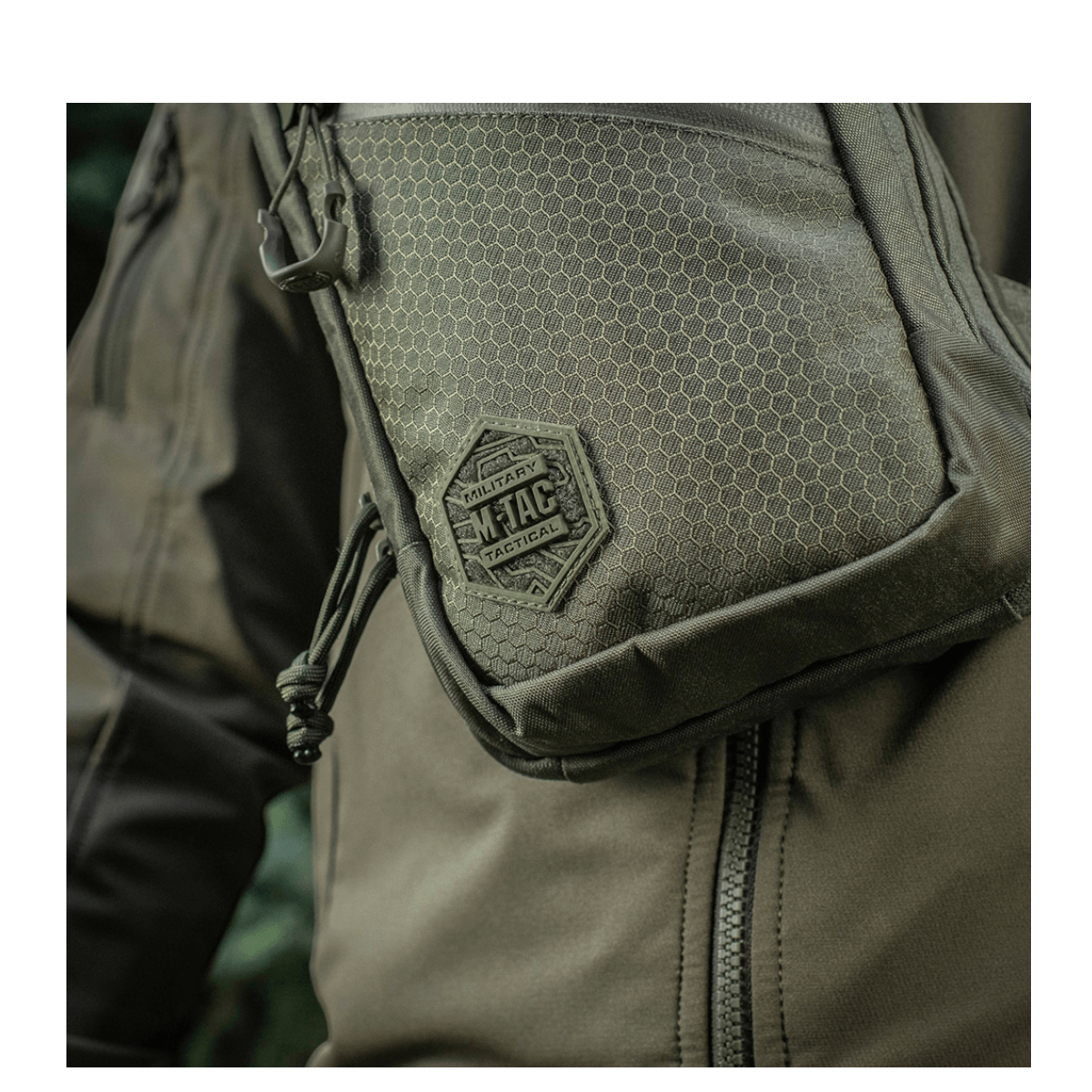 M-Tac Sling Pistoltaske Elite Hex i slidstærk Cordura med YKK lynlåse, stilfuldt design til diskret våbentransport.