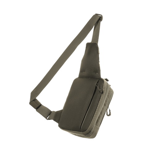 M-Tac Sling Pistol Bag Elite Hex in robust Cordura with adjustable shoulder strap and roomy compartments for concealed weapon transport.