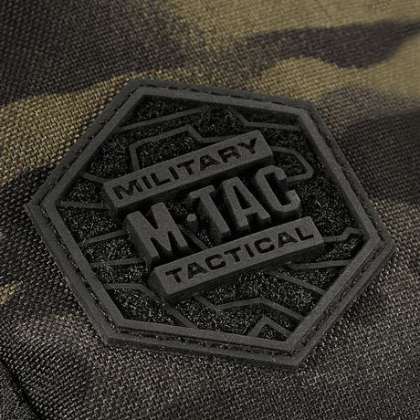 Close-up of M-Tac Sling Pistol Bag Elite Hex logo on robust Cordura material with camouflage design.