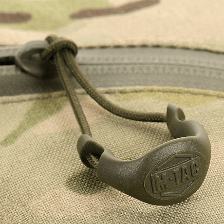 Close-up of M-Tac Sling Pistol Bag Elite Hex zipper showing Cordura 1000D material.
