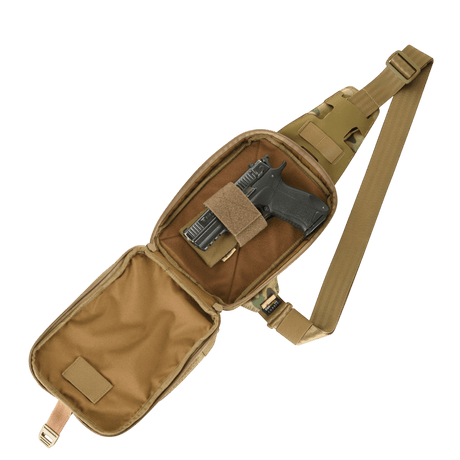 M-Tac Sling Pistol Bag Elite Hex with adjustable strap and compartment for concealed weapon, shown open with contents