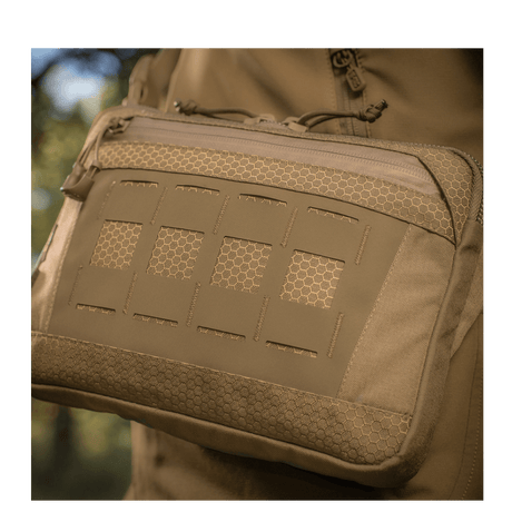 M-Tac Admin Bag Elite in Cordura material with adjustable shoulder strap and YKK zippers, shown in an outdoor setting