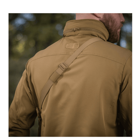 Rear view of a person wearing M-Tac Admin Bag Elite with adjustable shoulder strap