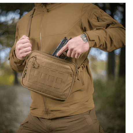 M-Tac Admin Bag Elite made from Cordura, worn outdoors by a person in tactical clothing, showing the bag's size and design