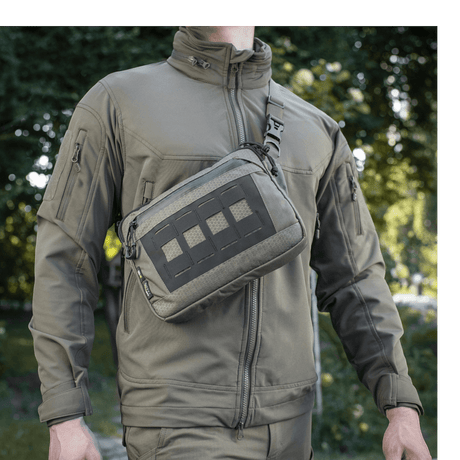 M-Tac Admin Bag Elite worn by a person in a forest environment, made from Cordura 500D and Hex with zippers