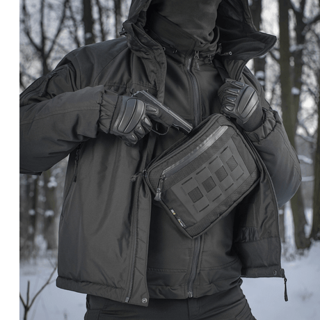M-Tac Admin Bag Elite in use with tactical gear in a forest environment