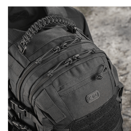 Close-up detail of M-Tac Mission Pack Elite backpack with durable Cordura 1000D and MOLLE LASER CUT system.
