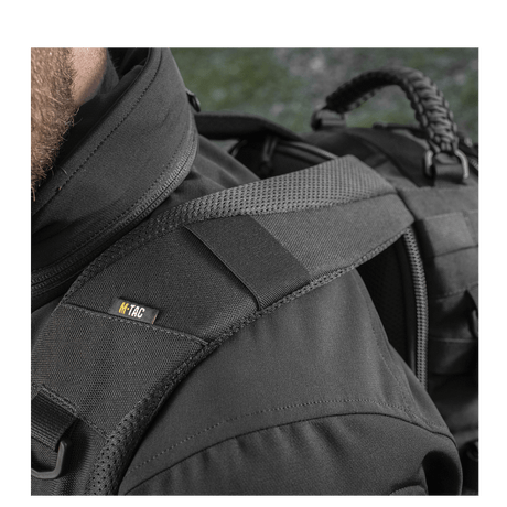 Detailed image of M-Tac Mission Pack Elite backpack in Cordura 1000D with MOLLE LASER CUT system for increased functionality and durability.