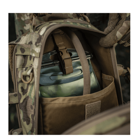 Detailed image of M-Tac Mission Pack Elite with MOLLE LASER CUT system and durable Cordura 1000D. Ergonomic and stylish backpack.