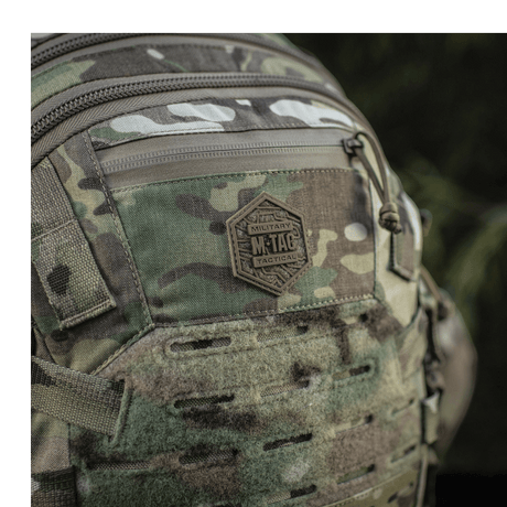 Camouflage M-Tac Mission Pack Elite with durable Cordura 1000D and MOLLE LASER CUT system for versatile use.