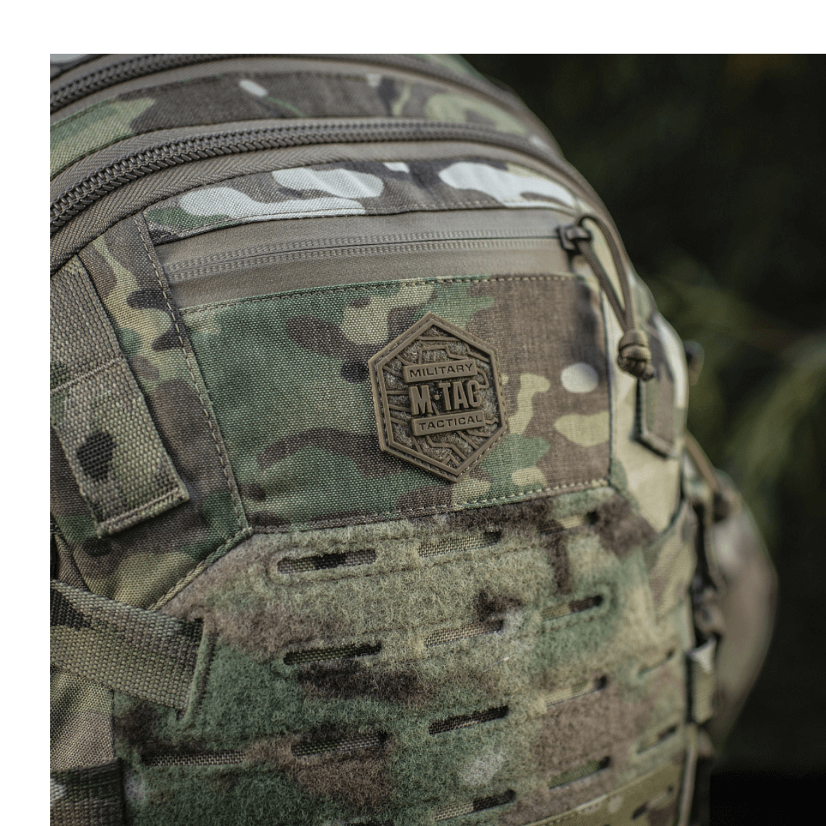 Camouflage M-Tac Mission Pack Elite med slidstærkt Cordura 1000D og MOLLE LASER CUT-system til alsidig brug.