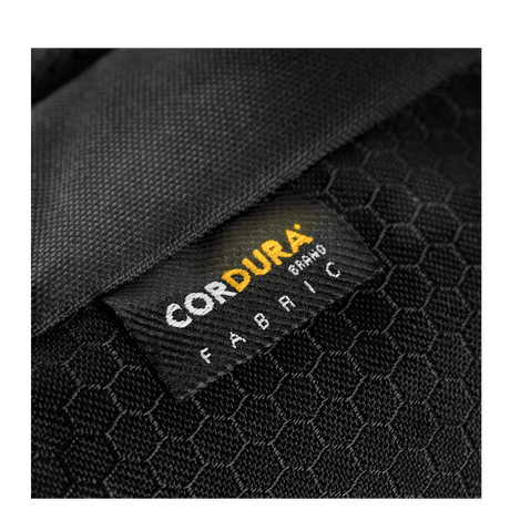 Detail of the Cordura fabric label on M-Tac Konvert Taske Elite, highlighting durability and style.