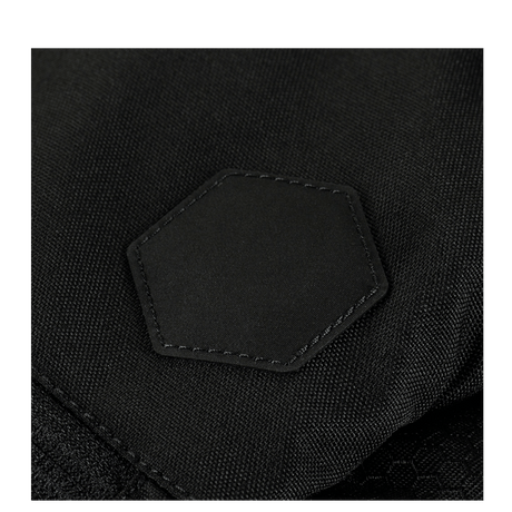 M-Tac Konvert Taske Elite in durable Cordura material, close-up of the bag's innovative design with hexagonal detail.