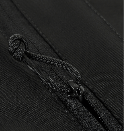 Closure detail of M-Tac Konvert Bag Elite with magnetic flap and robust Cordura material.