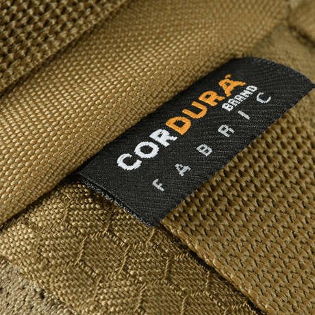 Close-up of Cordura patch on M‑Tac Belt Bag Elite Hex made of durable Cordura 500D fabric in brown.
