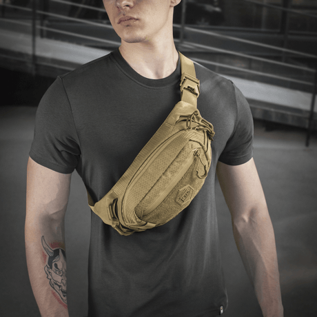 Person with M‑Tac Belt Bag Elite Hex in stylish design, ideal for everyday or tactical use. Made in Cordura with quality zippers.