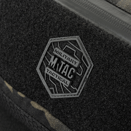 M-Tac Elite Hex belt bag with Hex logo and tactical design, close-up of black Cordura fabric and waterproof zipper.