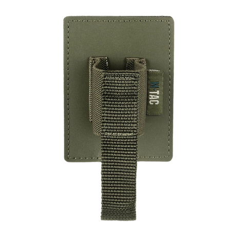 M-Tac modular insert for pepper spray in polymer composite with elastic and strap for secure storage on Velcro panel.