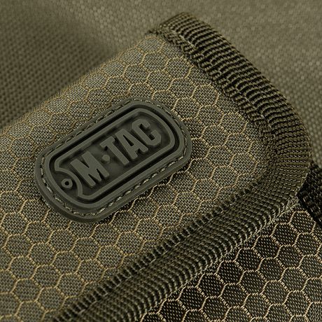 Close-up of M-Tac Wallet Elite Gen.II Hex in durable Cordura material with YKK zipper, suitable for storing cash and cards.