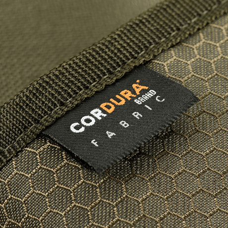 Close-up of M-Tac Wallet Elite Gen.II Hex with Cordura Hex 1000D fabric label showing robust material.