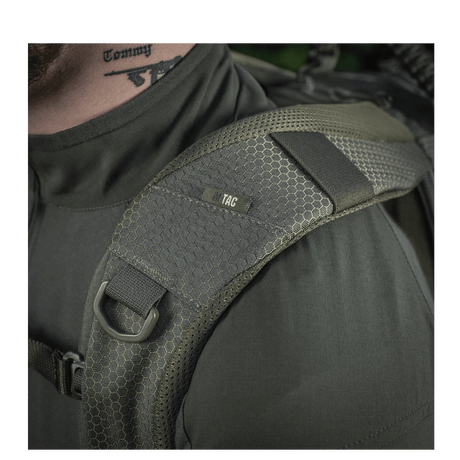 Close-up of M-Tac Mission Backpack Elite Hex with ergonomic shoulder strap made from Cordura Hex 1000D, including MOLLE LASER CUT system.