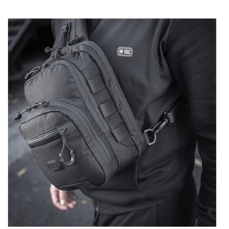 M-Tac Cross Bag Slim Elite Hex worn over the shoulder, showing stylish design and Cordura fabric.