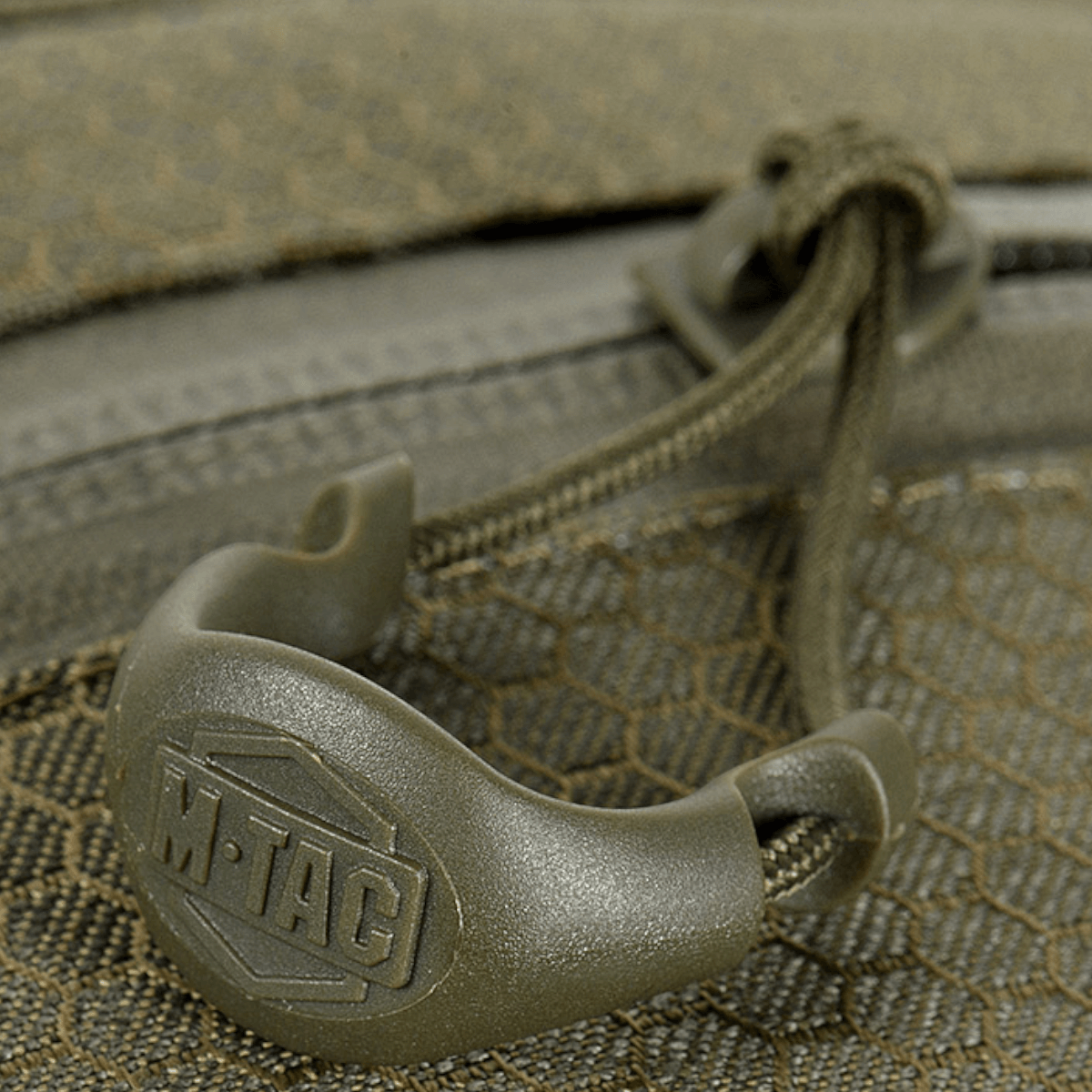 M-Tac Cross Taske Slim Elite Hex i holdbart materiale med stilfuldt design og kvalitetslynlås fra YKK