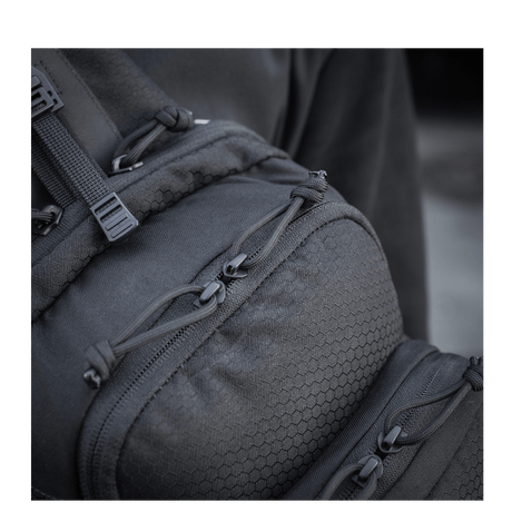 Close-up of M-Tac Cross Bag Slim Elite Hex with Hex pattern and YKK zippers, made from Cordura 500 and Cordura Hex materials.