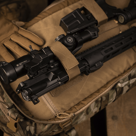 M‑Tac Backpack Inserts (3 pcs) with adjustable inserts for AR‑15 and AK carbines, secured with Velcro on a camouflage background.