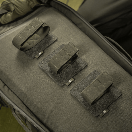 M‑Tac Backpack Inserts (3 pcs) in a bag with adjustable Velcro straps for AR‑15 and AK, designed for weapon boxes, rigid plastic base for security.