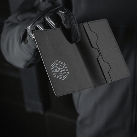 M‑Tac passport cover in black polymer composite with stylish logo and internal compartments, protects passport from wear and damage, perfect for travel.