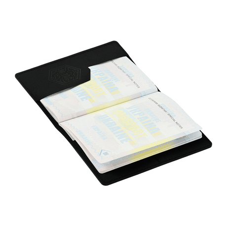 M‑Tac passport cover in black polymer protects the passport with a stylish look and practical card pockets, ideal for travel. Size: 13.5 x 10 cm.