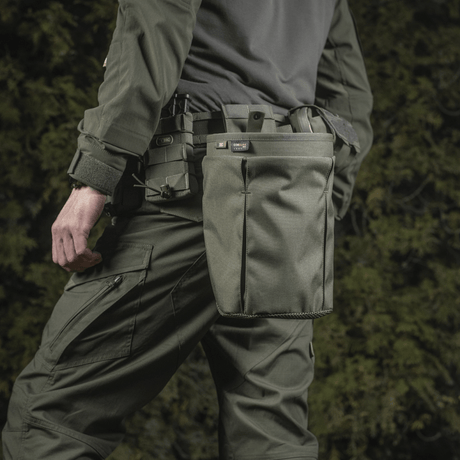 M‑Tac magazine pouch Dump Pouch Lite Elite mounted on belt for quick magazine storage during outdoor activities.