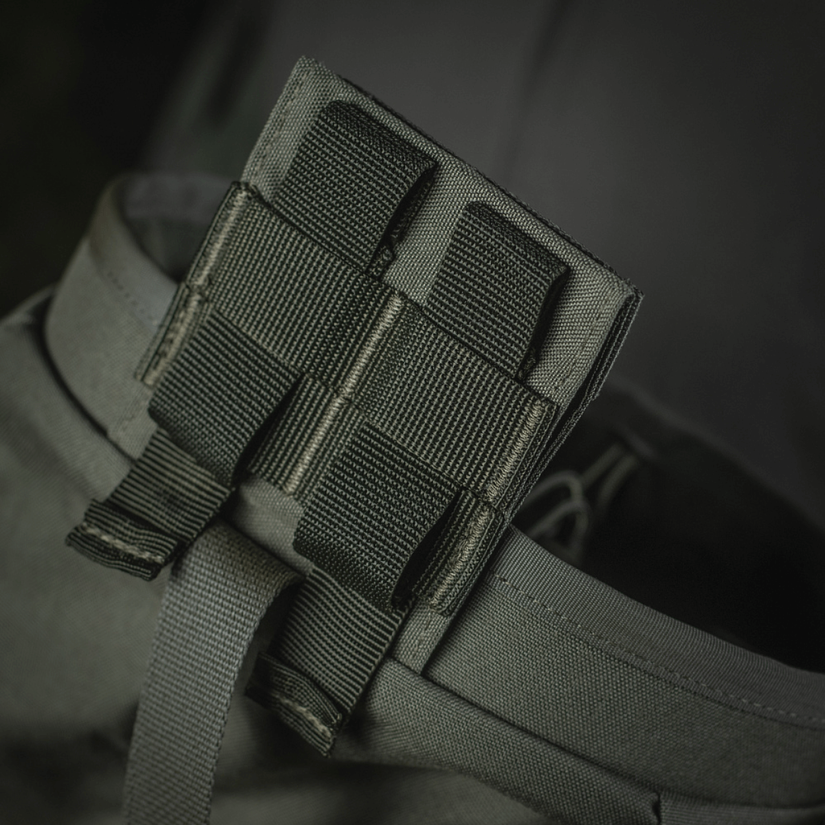 M‑Tac Magasinsæk Dump Pouch Lite Elite med MOLLE monteringssystem i Cordura 500D materiale for robust og sikker opbevaring.