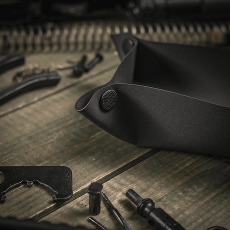 M‑Tac Field Maintenance Tray 18x30 cm in use with weapon parts.