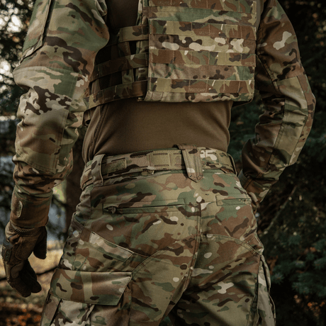 M-Tac Cobra Buckle Tactical Belt Laser Cut on a soldier in camouflage uniform with MOLLE interface.