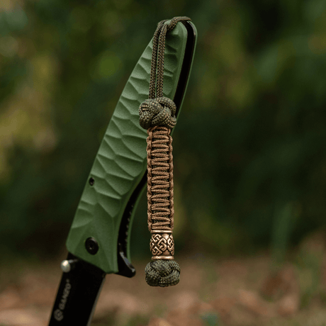 M-Tac Knife Lanyard Celtic braided paracord knife accessory that highlights personal style and practical use in outdoor and everyday activities.