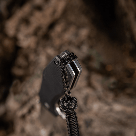M-Tac Knife Lanyard Celtic - black braided paracord lanyard on a knife, adds style and functionality to knives, flashlights and gear.