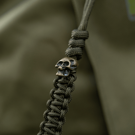 M-Tac Loopy Snake Skull Lanyard in paracord with skull pendant, durable and flexible accessory for knives and gear.