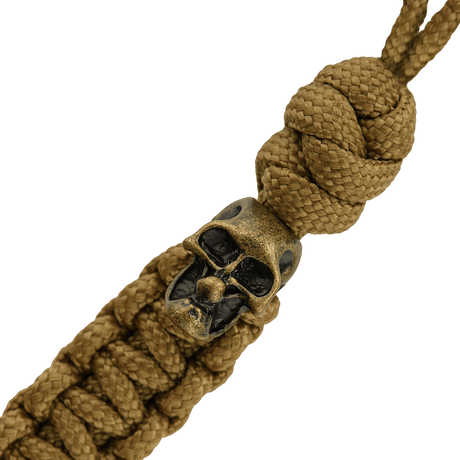 M-Tac Loopy Snake Skull Lanyard in braided paracord, designed for knives and gear, with decorative skull.