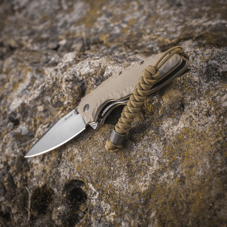 M-Tac Viper Lanyard Stainless Steel with braided paracord and stainless Viper bead on knife handle, for quick access.