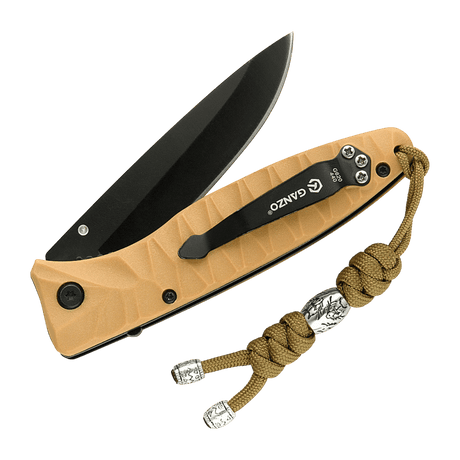 M-Tac Zeus Stainless Steel Lanyard on a knife, braided paracord with decorative steel bead, practical for quick access to gear.