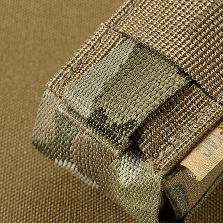 M-Tac Gasdåseholder Vertikal for MOLLE system, made from MIL-SPEC straps with Woojin lock for easy operation, close-up in camouflage.