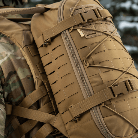 M-Tac Sturm Elite Gen.II backpack in the field with MOLLE system and durable Cordura material for outdoor use.