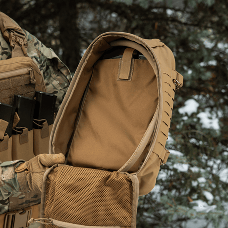 M-Tac Sturm Elite Gen.II open with spacious interior and MOLLE system, ideal for self-sufficient stays. Made in durable Cordura.