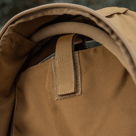 Interior compartment of M-Tac Sturm Elite Gen.II with adjustable strap and hydration bladder flap, made from durable Cordura material.