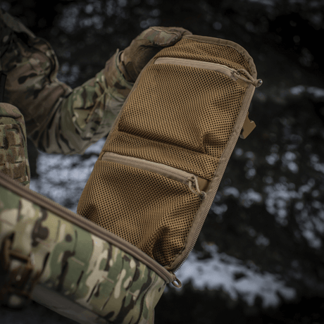 M-Tac Sturm Elite Gen.II with opened main compartment with mesh pockets for EDC gear in the field, military camouflage design.