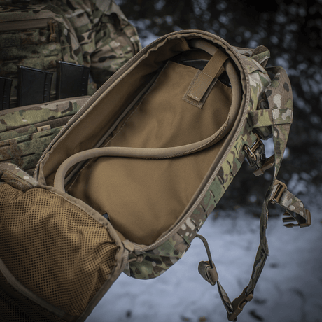 M-Tac Sturm Elite Gen.II backpack with open main compartment and hydration system in military forest camouflage.
