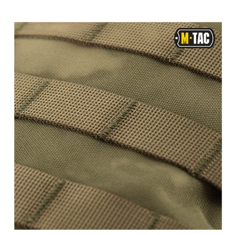 M-Tac Assault Pack with MOLLE system in khaki fabric, close-up view